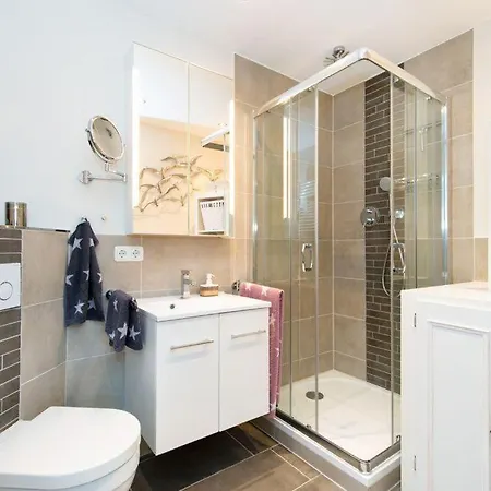 Апартаменты Appartement-leuchtturmblick Хёрнум